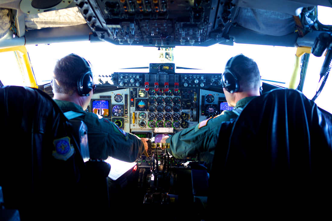 Illinois National Guard Pilots fyling a C-135 Aircraft